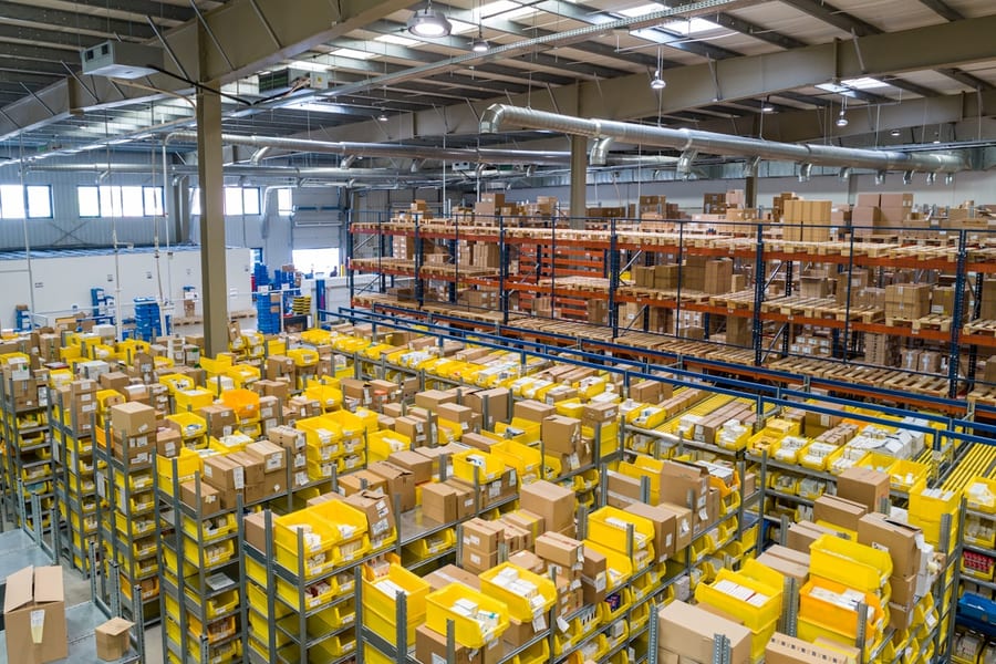 Team loading bulk cartons for business logistics